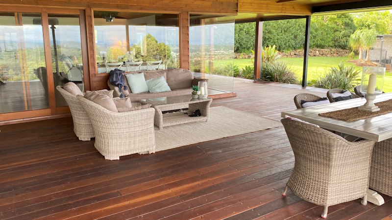 A luxury veranda, with wooden decking, one of the many film locations available from Qld Film Locations